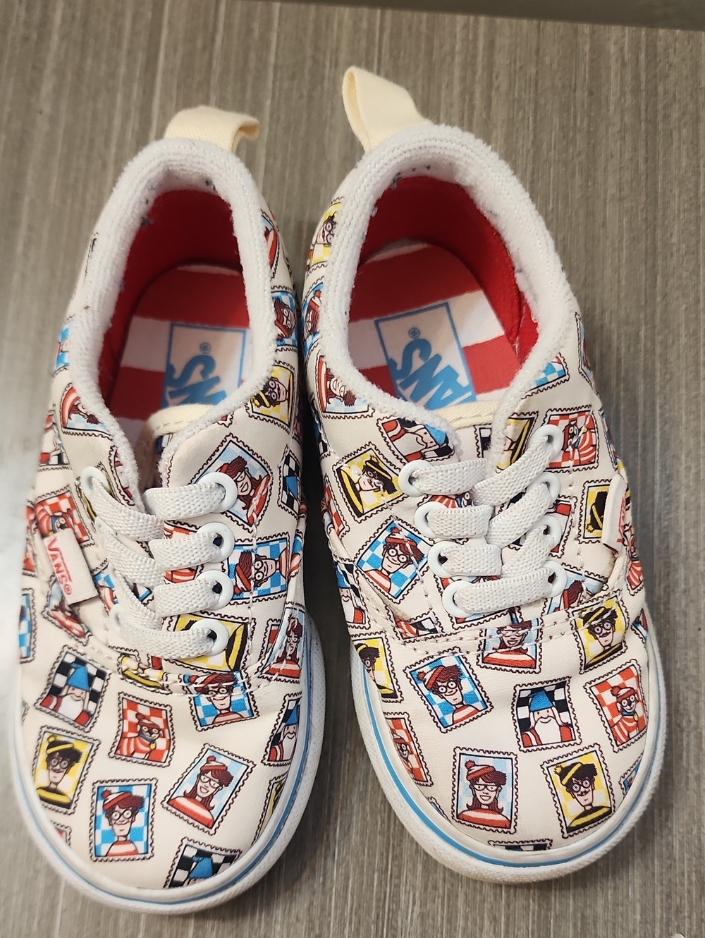 Vans Kids Low-Top Sneakers in White with Red, Blue & Yellow Accents